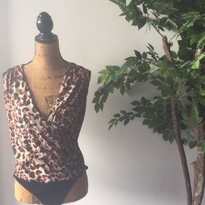 Bebe leopard body suit